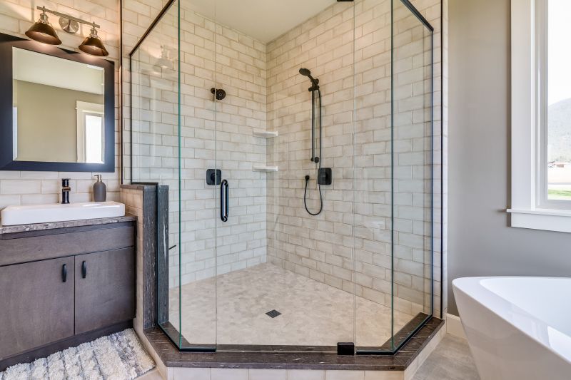 Walk-in shower with glass enclosure
